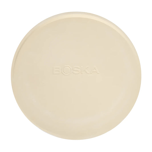 Boska pietra refrattaria da pizza con supporto calda in tavola