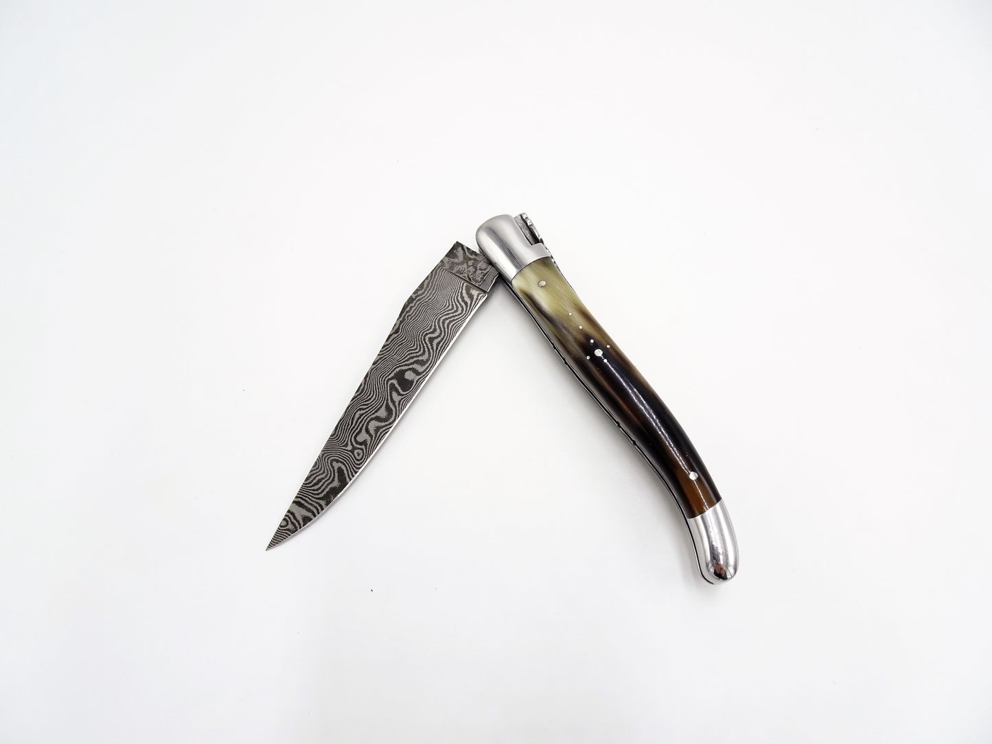 Laguiole en Aubrac coltello collezione punta di corno damascato