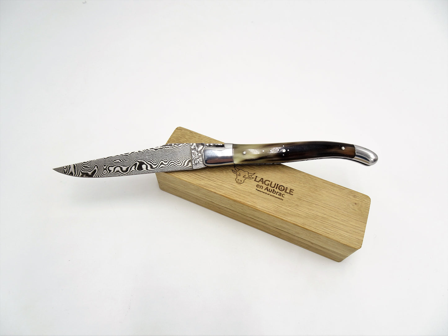 Laguiole en Aubrac coltello collezione punta di corno damascato