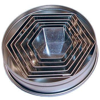Set di sei esagoni in acciaio inox da 3,5 a 9 cm. alti 2 cm.