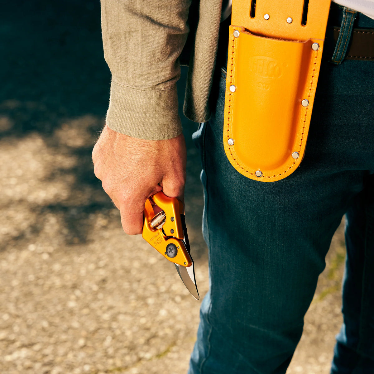 FELCO 6 Electric Arancione + 910 Fodero in vero cuoio
