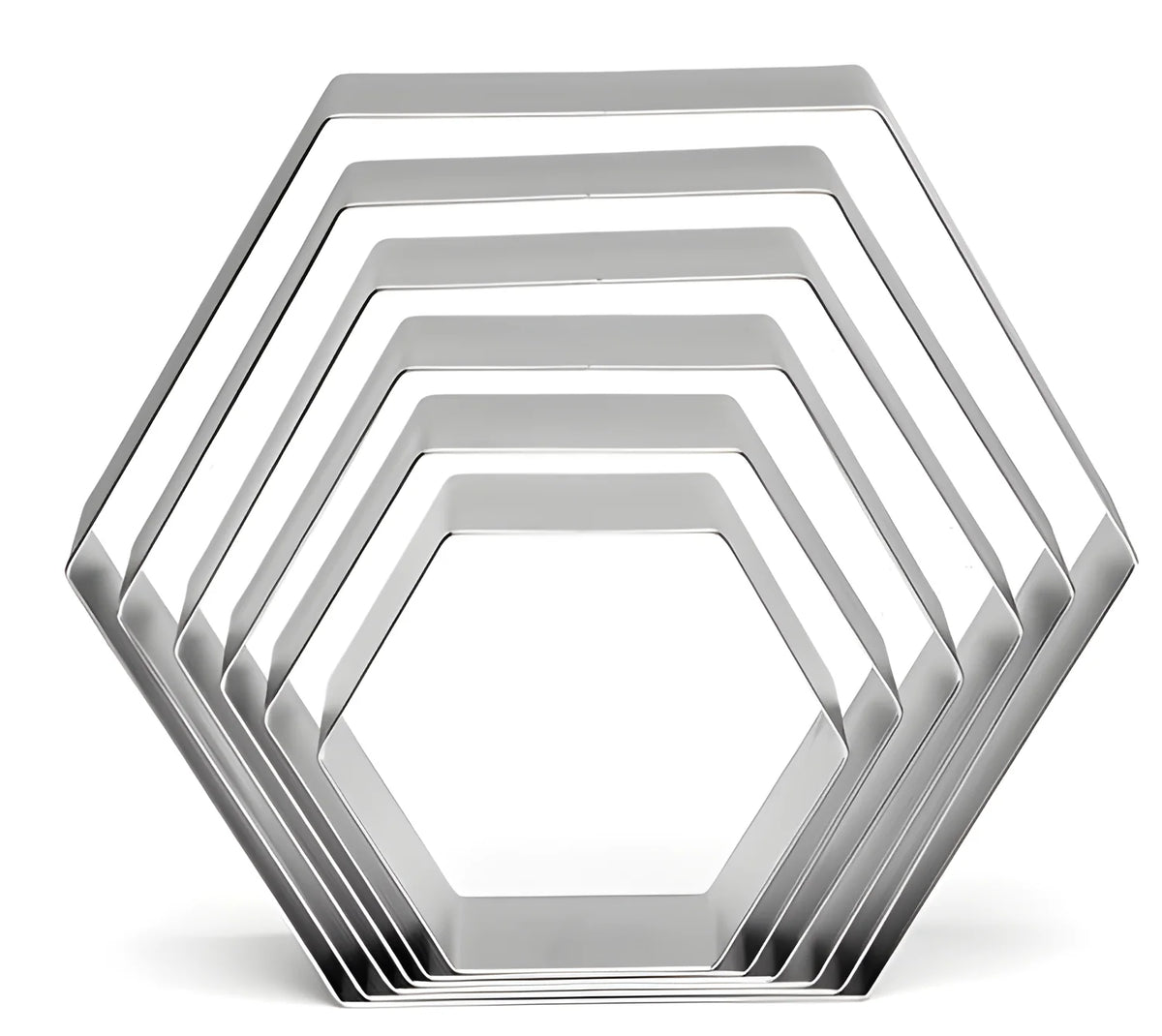 Set di sei esagoni in acciaio inox da 3,5 a 9 cm. alti 2 cm.