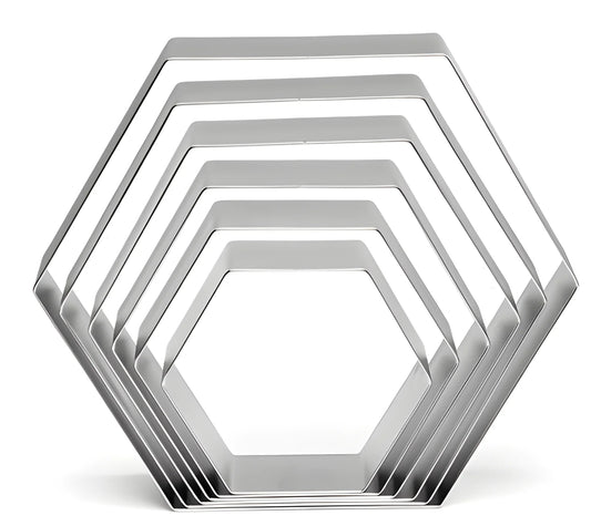 Set di sei esagoni in acciaio inox da 3,5 a 9 cm. alti 2 cm.