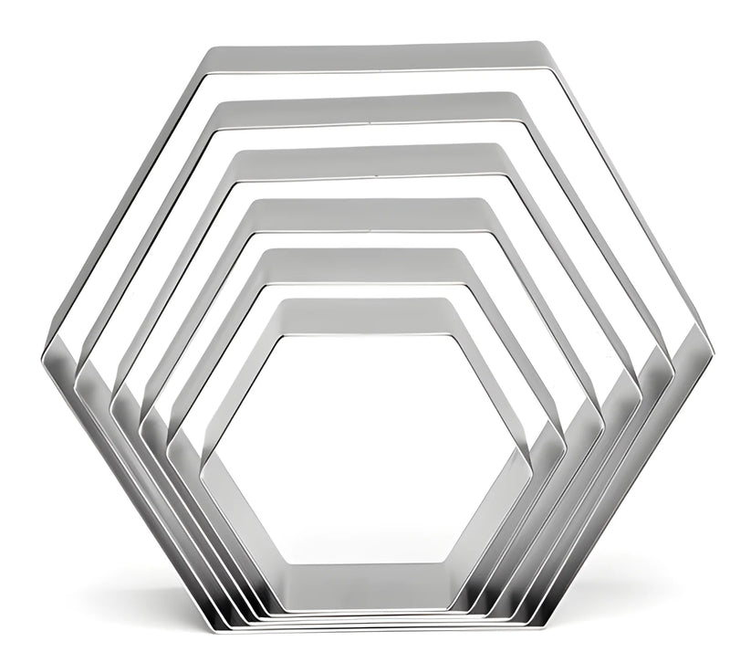 Set di sei esagoni in acciaio inox da 3,5 a 9 cm. alti 2 cm.