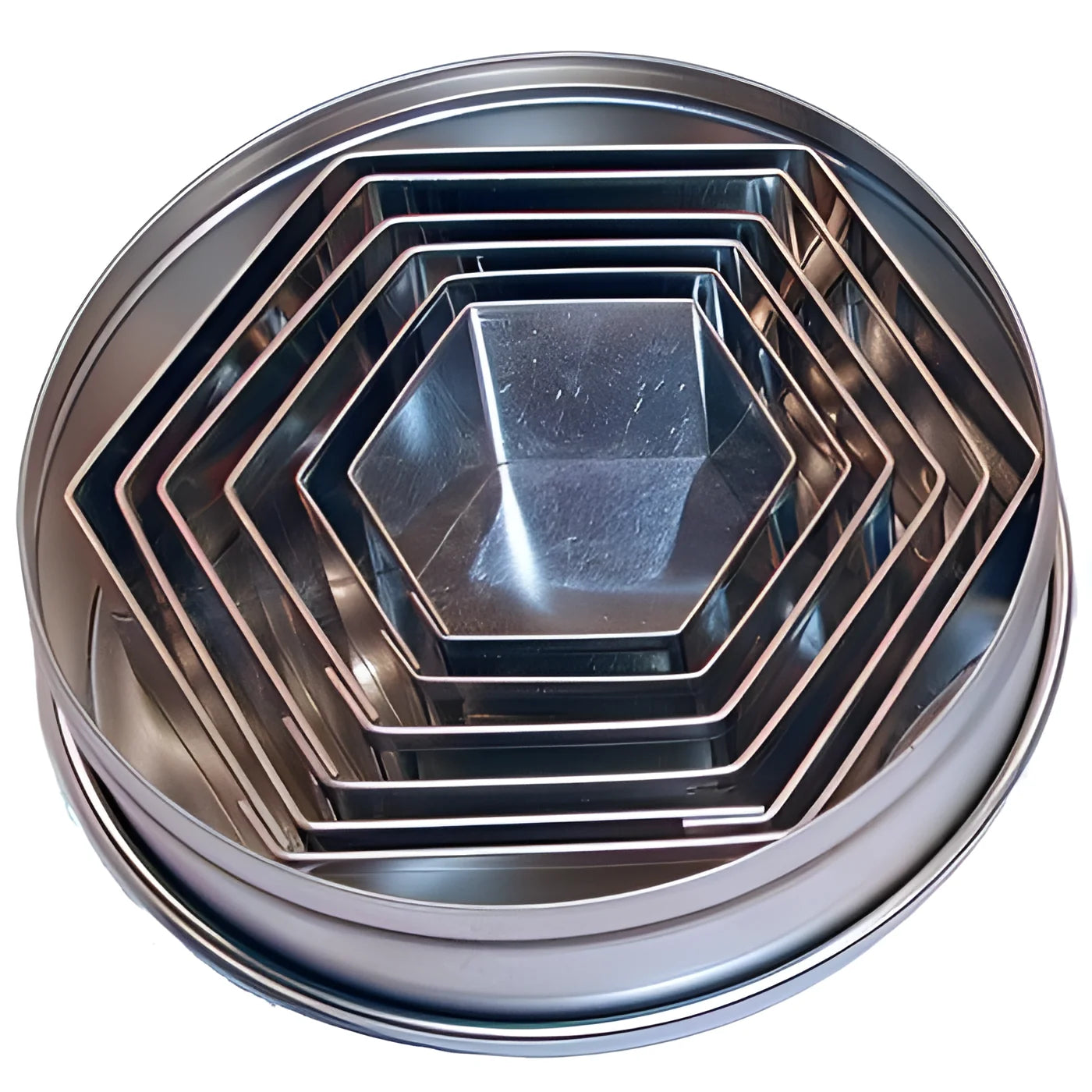 Set di sei esagoni in acciaio inox da 3,5 a 9 cm. alti 2 cm.