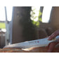 Global SAI-05 cm. 23 coltello da cucina per pane martellato