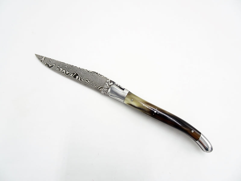 Laguiole en Aubrac coltello collezione punta di corno damascato